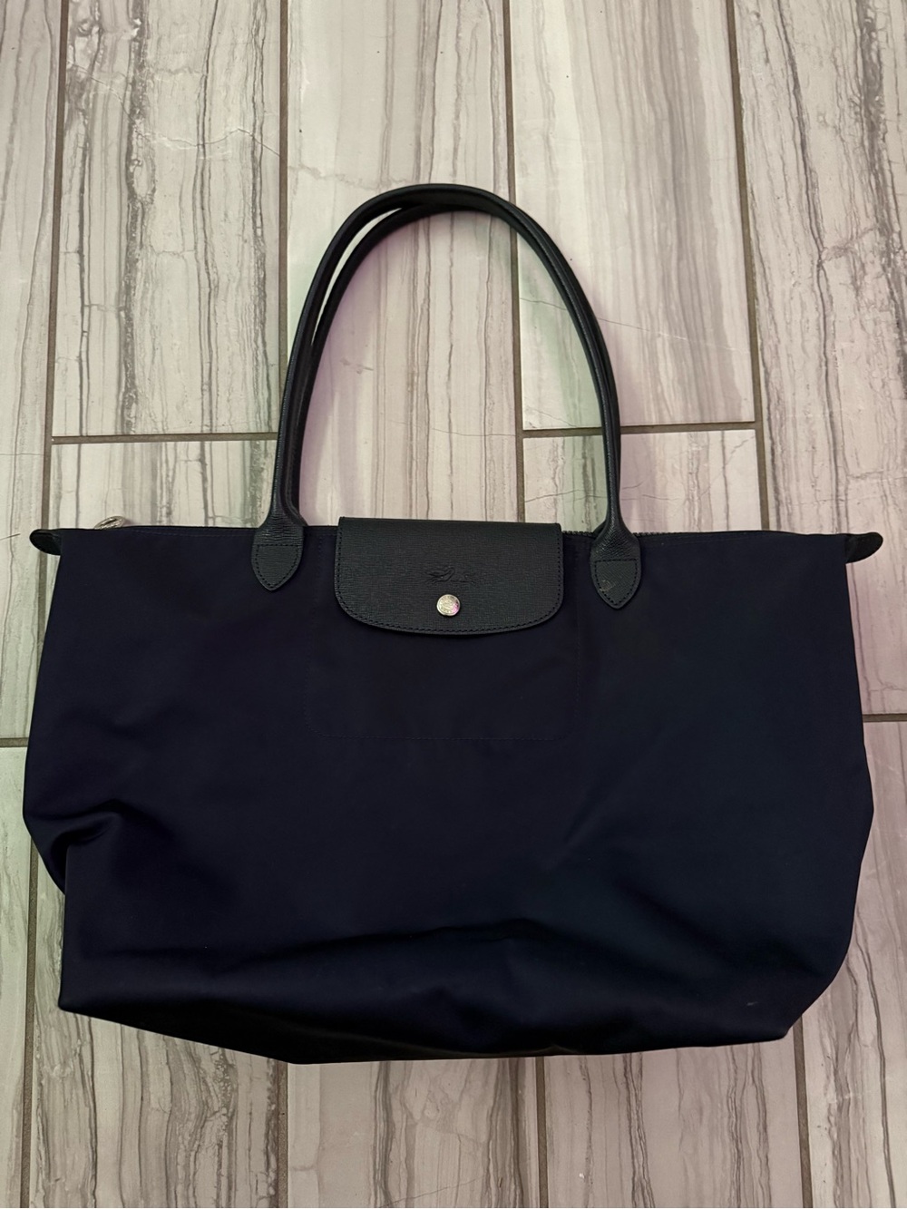 Longchamp Le Pliage tote bag.
